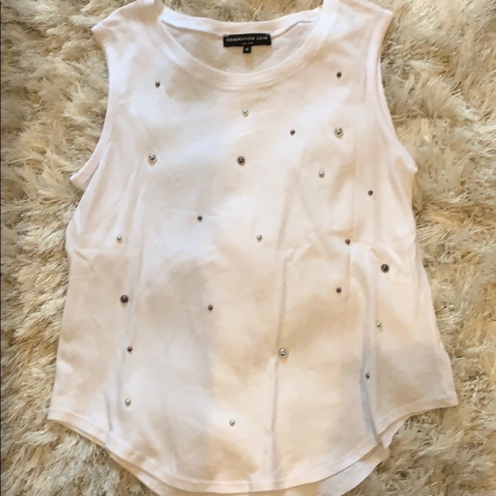 Tank with studs